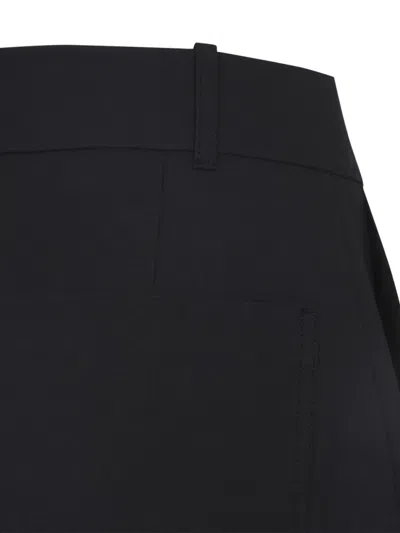 Studio Nicholson Buttoned High-waisted Trousers In Black