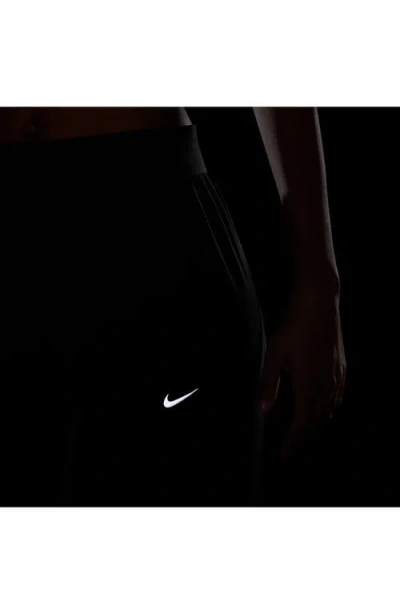 Nike Swift Dri-fit Mid Rise Running Pants In Black