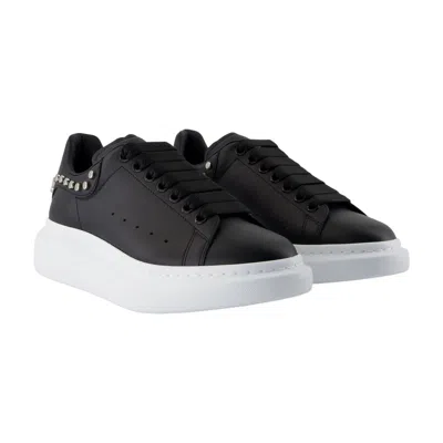 Alexander Mcqueen Studded Oversize Sneakers In Black