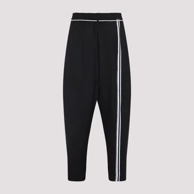 Mordecai Tapered Black Trousers With Pleated Front In Black
