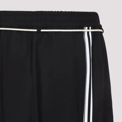 Mordecai Tapered Black Trousers With Pleated Front In Black