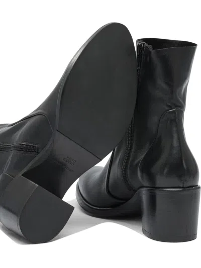 Strategia Black Rubber Ankle Boots In Black