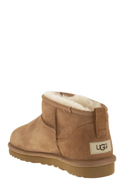Ugg Biscuit Suede Classic Ultra Mini Ankle Boots In Brown
