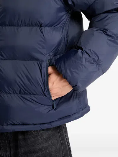 Calvin Klein Monogram Puffer Jacket In Blue