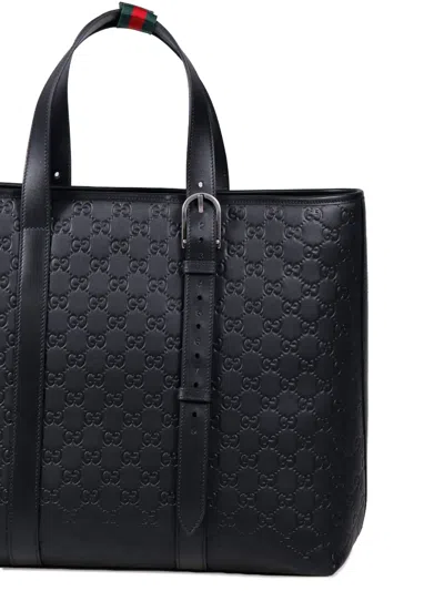 压纹扣环手提包