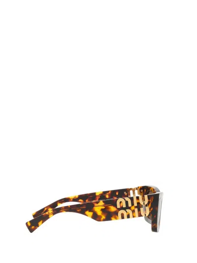 Miu Miu Eyewear Rectangular Frame Sunglasses In Brown