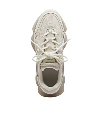 Axel Arigato Eris White Low Top Sneakers With Logo Patch On The Tongue In Leather And Fabric Woman