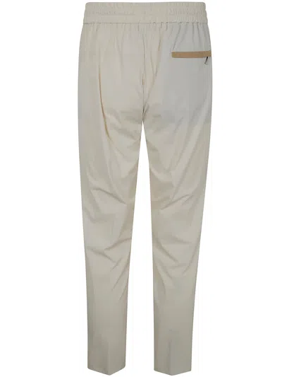 Devore Incipit Trousers In Neutral