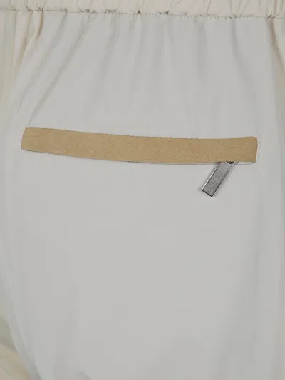 Devore Incipit Trousers In Neutral