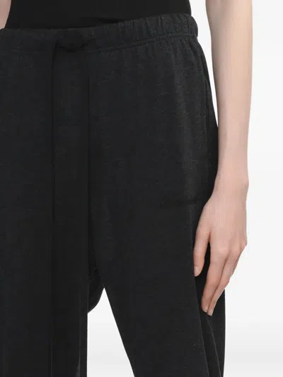 Essentials Drawstring-fastening Flared Track Pants In Black