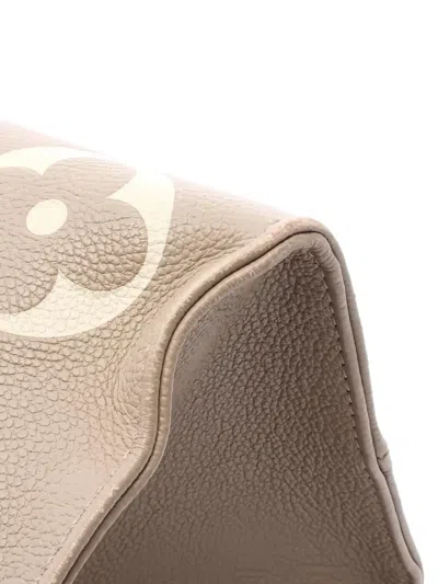 Pre-owned Louis Vuitton 2000s Mm Onthego Monogram Tote Bag In Neutral