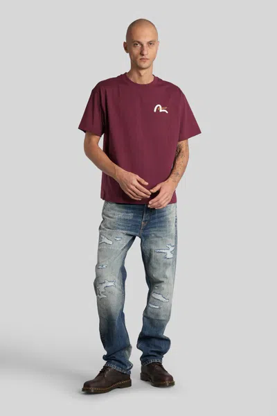 Evisu Distressed Jeans In Blue