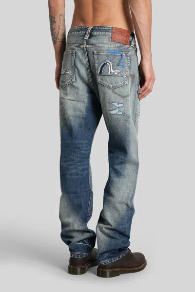 Evisu Distressed Jeans In Blue