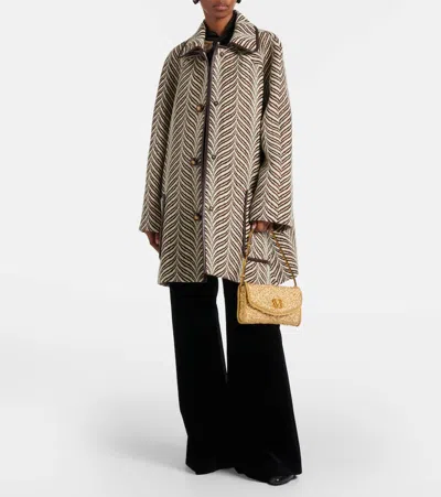 Valentino Garavani Mini Structured Handbag With Signature Detailing In Gold