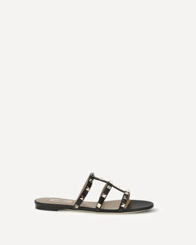 Valentino Rockstud Slide Sandal In Laminated Nappa With Cabochon In Black