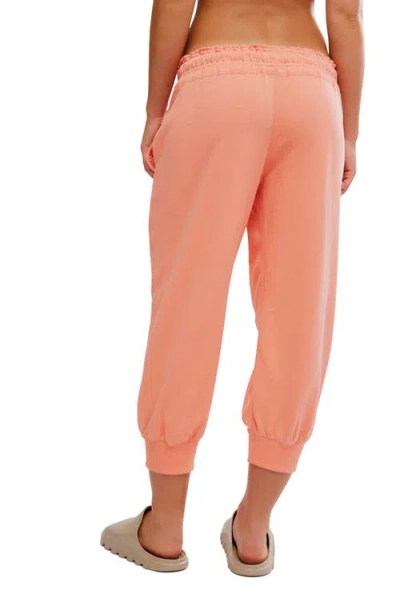 Free People Fp Movement Flutter Crop Joggers In Orange