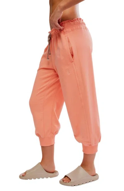 Free People Fp Movement Flutter Crop Joggers In Orange