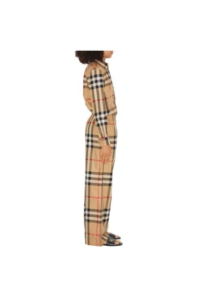Burberry Check-pattern Flared Cotton Trousers In Brown