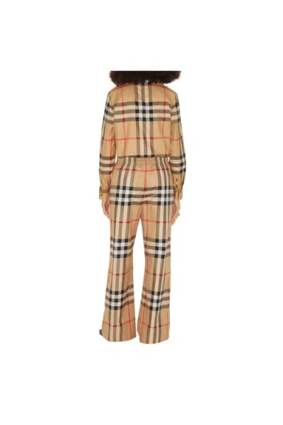 Burberry Check-pattern Flared Cotton Trousers In Brown