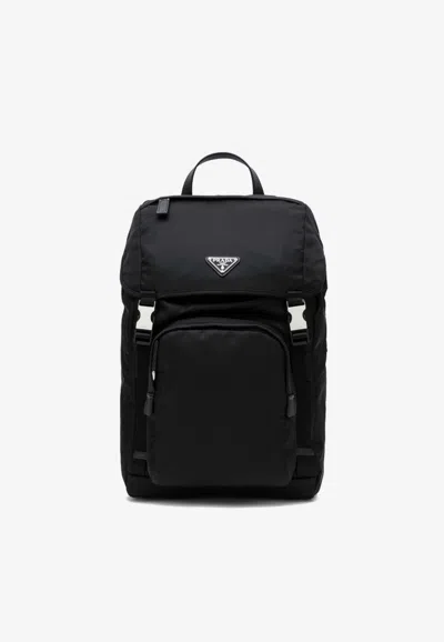 Prada Triangle Logo Zipped Backpack In Black