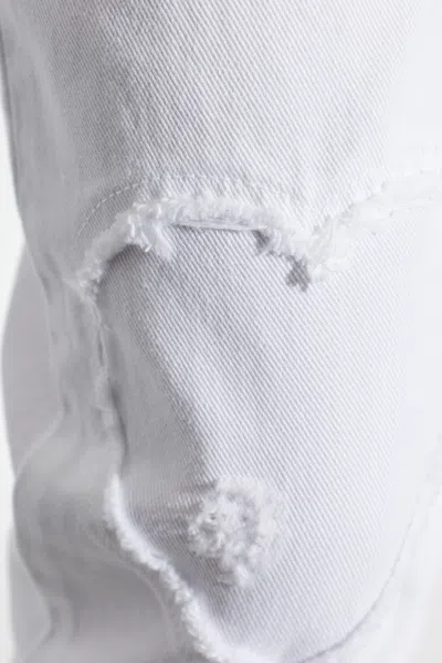 Moschino Distressed Denim Jeans In White