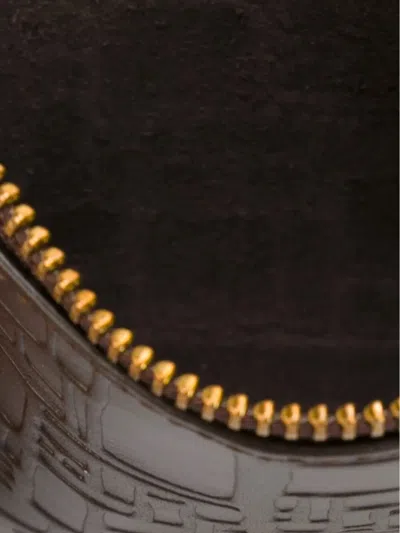 Comme Des Garçons Embossed Logotype Pouch In Brown