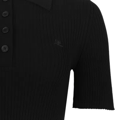 Courrèges Ribbed Short-sleeved Polo Shirt With Buttoned Placket In Black