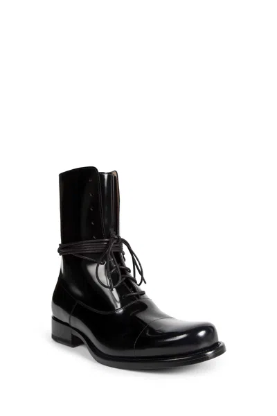 The Row Kai Lace Up Boots In Black