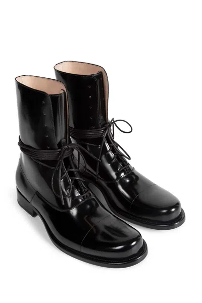The Row Kai Lace Up Boots In Black