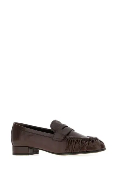 Prada Brown Ruched Loafers With Logo In Brown