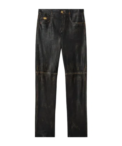 Versace Button-fastening Trousers In Black