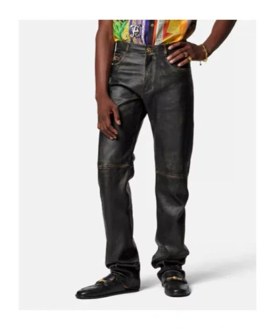 Versace Button-fastening Trousers In Black