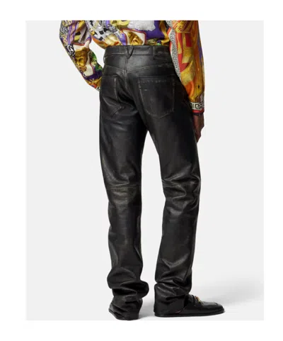 Versace Button-fastening Trousers In Black