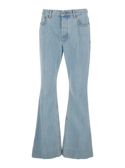 Valentino Logo Patch Flared Jeans In Blue