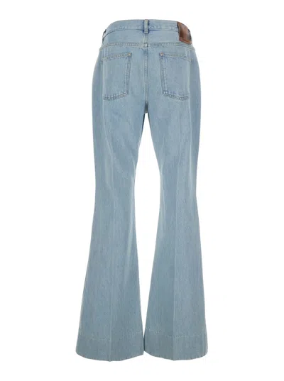 Valentino Logo Patch Flared Jeans In Blue