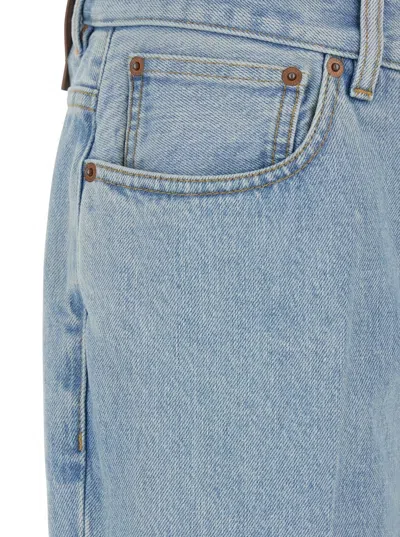 Valentino Logo Patch Flared Jeans In Blue