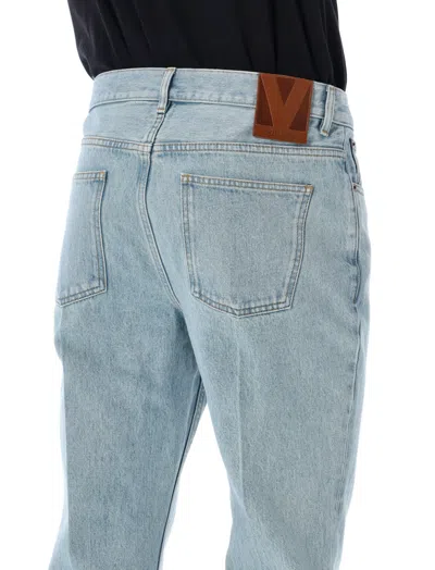 Valentino Logo Patch Flared Jeans In Blue