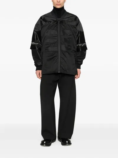 Ih Nom Uh Nit Perforated Panelled Jacket In Black