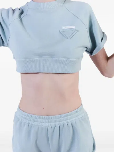 Prada Triangle-patch Jersey Mini Shorts In Blue