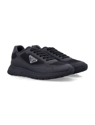 Prada Side Triangular Logo Low-cut Laced Casual Sneakers In Black