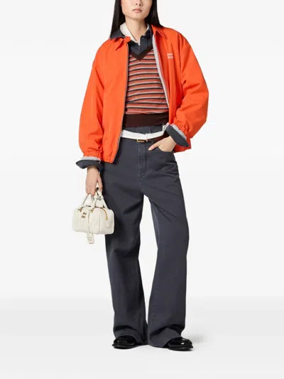 Miu Miu Logo-embroidered Jeans In Blue
