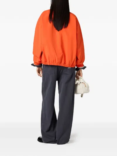 Miu Miu Logo-embroidered Jeans In Blue