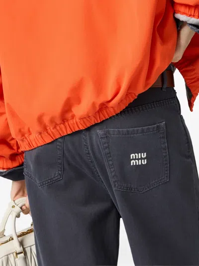 Miu Miu Logo-embroidered Jeans In Blue