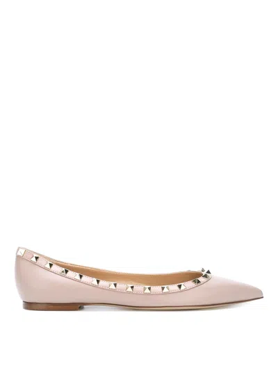 Valentino Pointed Toe Flat Shoes With Gold-tone Rockstuds In Pink