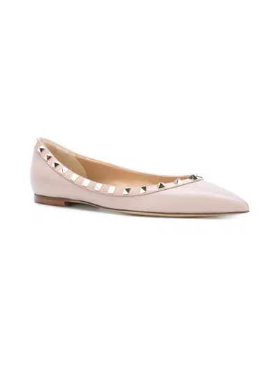 Valentino Pointed Toe Flat Shoes With Gold-tone Rockstuds In Pink