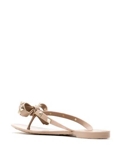 Valentino Garavani Mini Bow Sandals With Platinum-finish Studs And Thece Motif In Pink