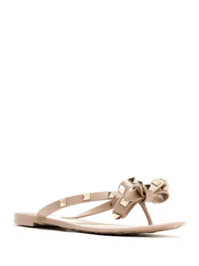 Valentino Garavani Mini Bow Sandals With Platinum-finish Studs And Thece Motif In Pink