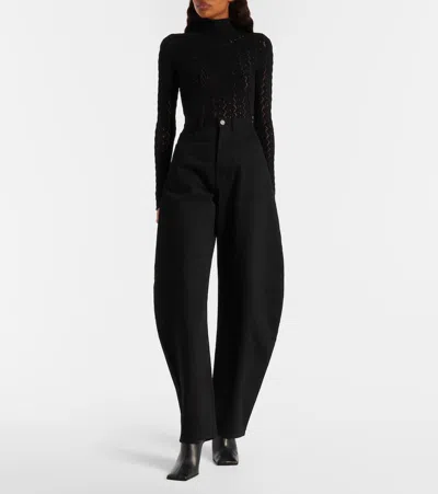 Alaïa 90 Leather Mules In Black