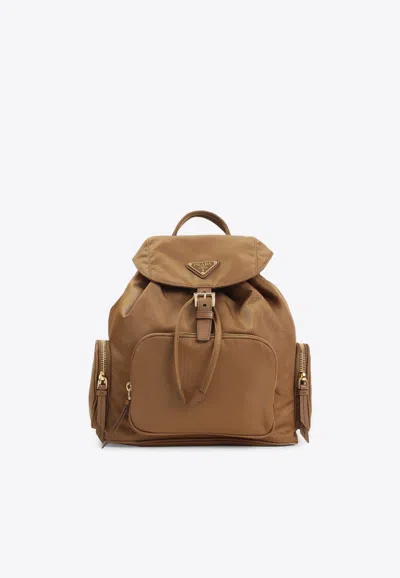 Prada Triangle Logo Nylon Backpack In Brown