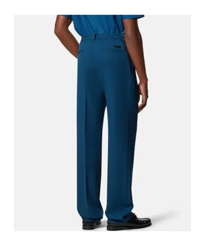Versace Wool Jogger Pants In Blue
